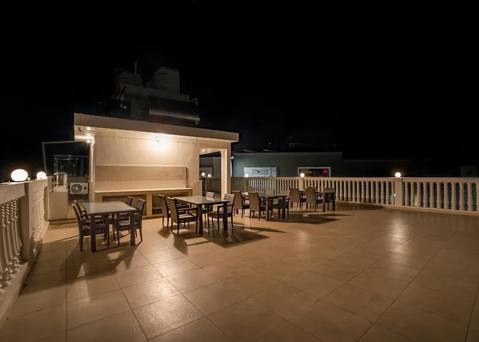 Aura Inn & Suites